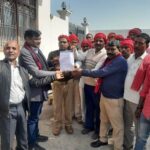 Village guards handed over Chief Minister nominated memorandum to MLA representative regarding salary increase and status of state employee.