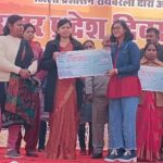Meritorious girl students were honored with a check of Rs 5,000 each.